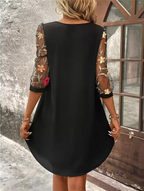 Crystal™ | Elegant dress with a V-neckline and eye-catching sleeves